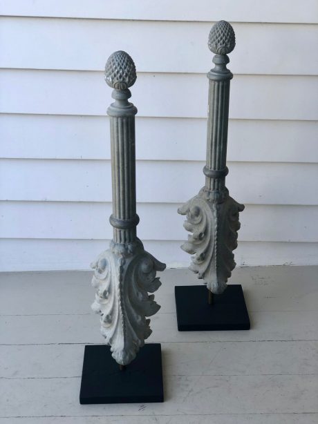 Pair of antique zinc finials mounted on wooden bases