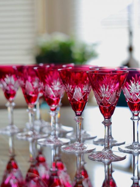 A set of ten Val St Lambert crystal cranberry double cut aperitif glasses