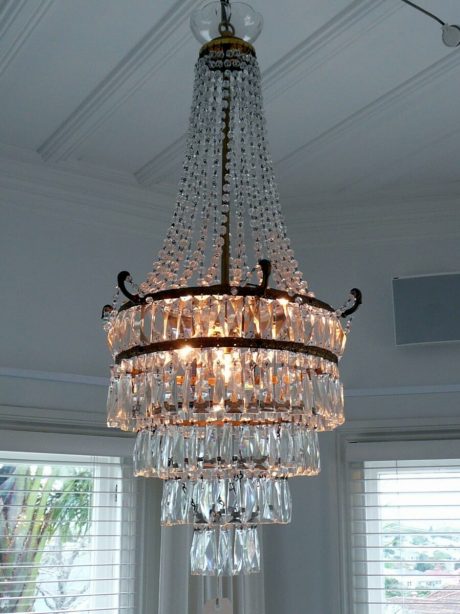 1950s French tiered crystal and brass chandelier