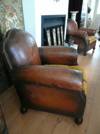 Single 1920s French leather studded club chair