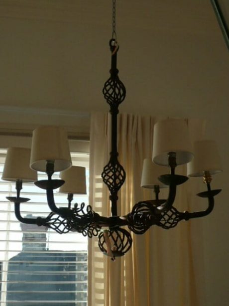 1950s six arm hand forged iron chandeliers