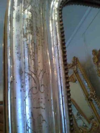 Silver gilded gesso mirror with gilded accents on cartouche c.1870