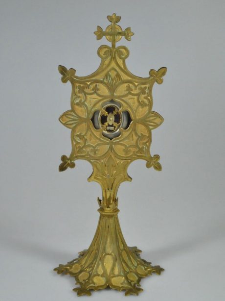 Brass reliquary gilded on foot 