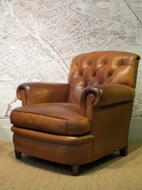 Pair of  button back armchairs in original leather upholstery