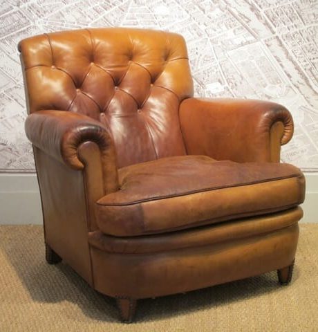 Pair of  button back armchairs in original leather upholstery