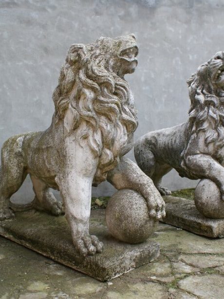 Pair of composite stone lions from England c.1950