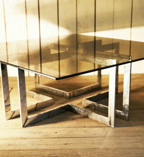 1970's glass coffee table with chromed base
