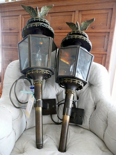 Pair of brass coach lantern wall sconces topped with eagles c.1920