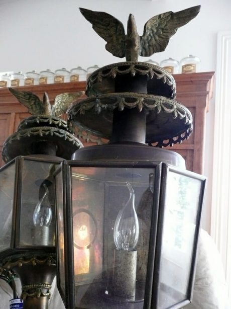 Pair of brass coach lantern wall sconces topped with eagles c.1920