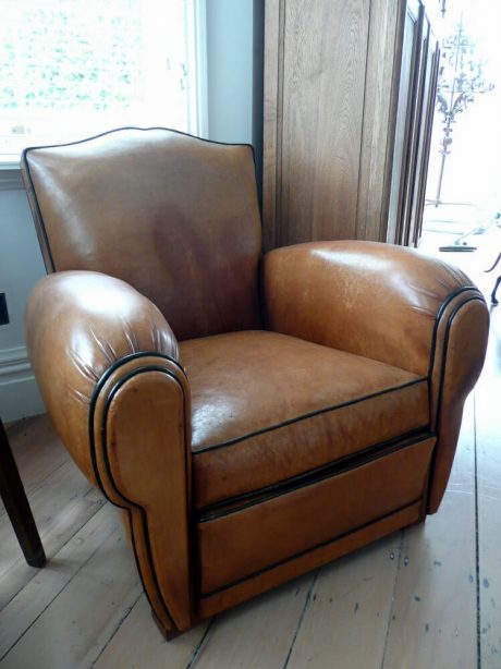 Pair of leather moustache back armchairs with black piping c.1950