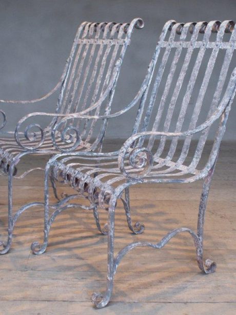 Pair of French antique wrought iron armchairs c.1900
