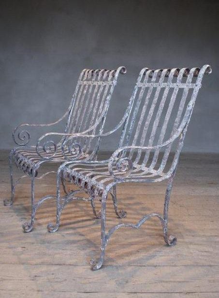 Pair of French antique wrought iron armchairs c.1900