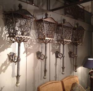 Two pairs of hand forged metal courtyard lanterns