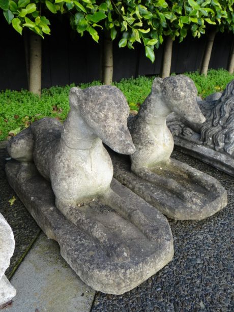 Pair of well patinated composite stone whippets