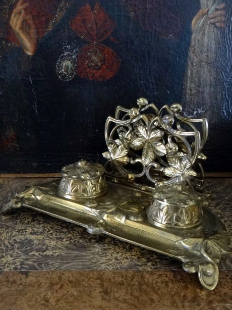 A  nineteenth century gilded bronze double inkwell stand