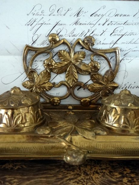 A  nineteenth century gilded bronze double inkwell stand