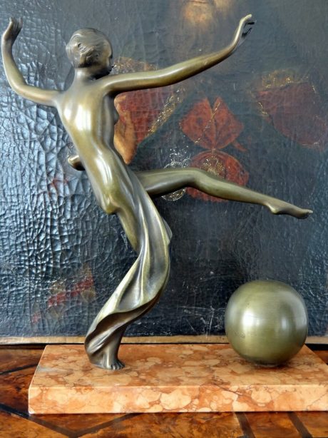 Bronze art deco figurine mounted on a marble plinth