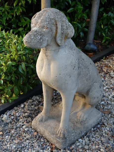 Pair of reconstituted stone dogs with nice weathering