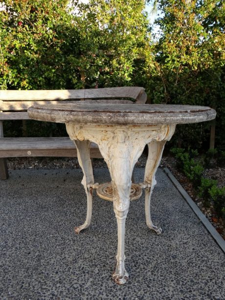 Early 20th century iron garden table with later reconstituted top