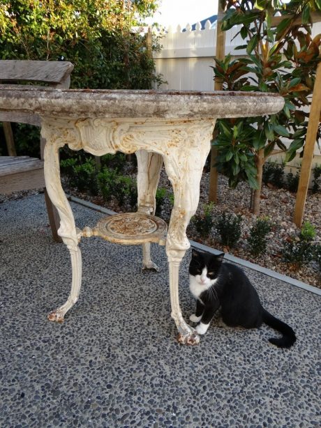 Early 20th century iron garden table with later reconstituted top