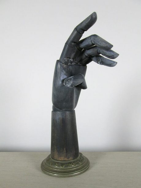 Articulated ebonised mannequin hand c. 1930