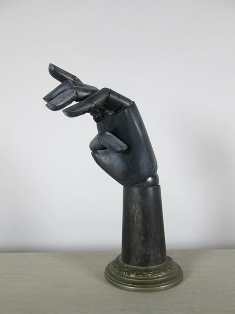 Articulated ebonised mannequin hand c. 1930