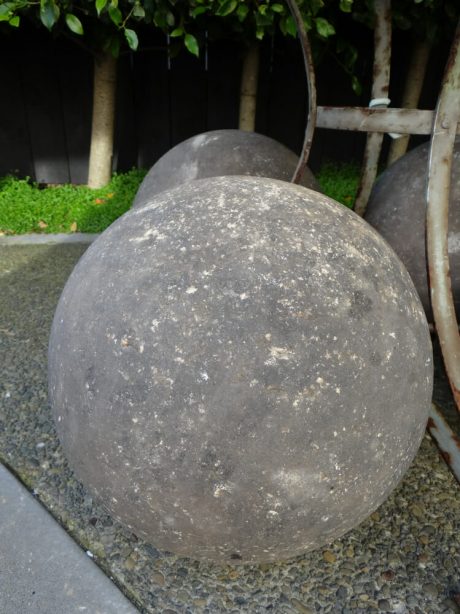 Four English antique stone balls with good patination