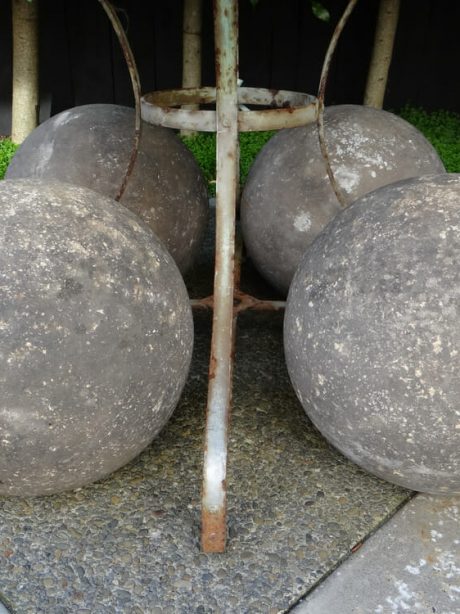 Four English antique stone balls with good patination