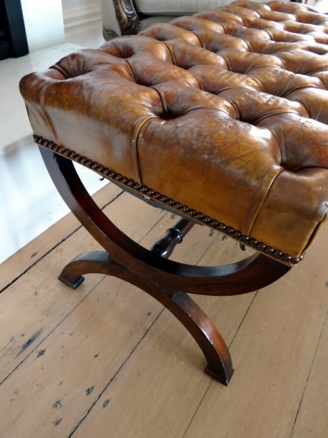A 20th century leather buttoned stool c.1950