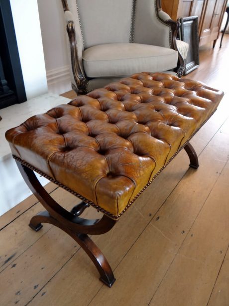 A 20th century leather buttoned stool c.1950