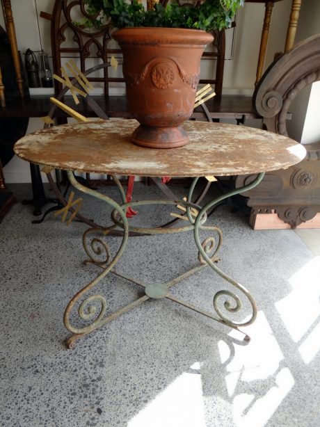 A wonderful oval iron garden table c.1840