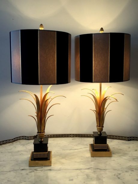 A pair of gilded brass palm lamps in the manner of Maison Jansen