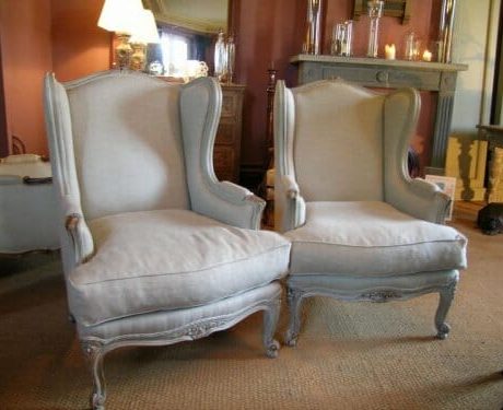 Pair of bergeres with new linen upholstery