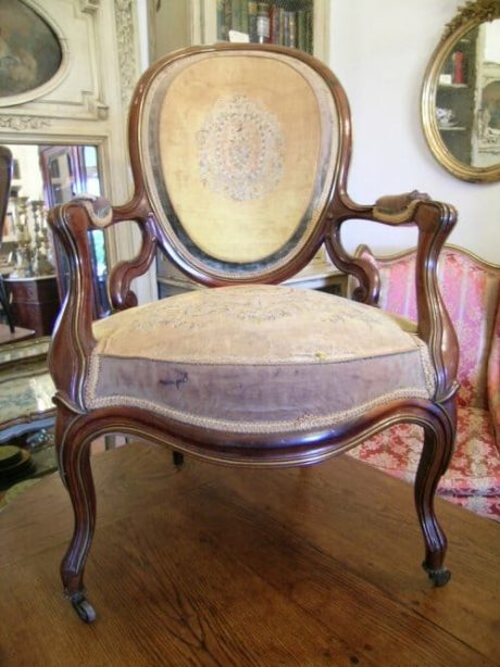 Mahogany tapestry fauteuil with medallion back and brass inlay c.1880