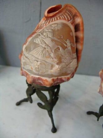 Pair of cameo carved conch shell lights on bronze tripod stands