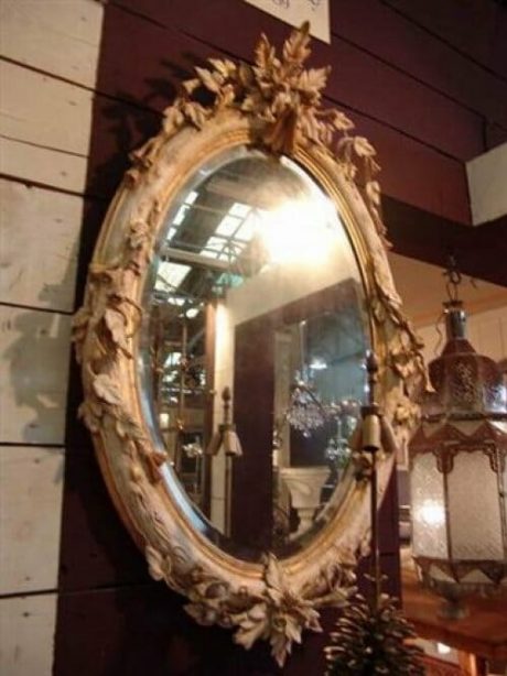 19th century french oval gilt and gesso mirror with foliate cartouche
