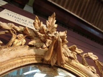 19th century french oval gilt and gesso mirror with foliate cartouche