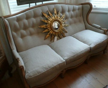 Antique bleached oak wing sofa c.1900 with new button back linen
