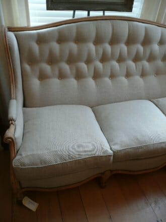 Antique bleached oak wing sofa c.1900 with new button back linen