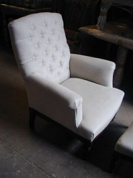 Turn of the century bergere chair and footstool recovered in buttonback linen