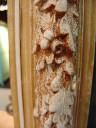 Wooden and gilded plaster mirror with foliate detailing c.1880