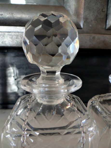 Trio of crystal decanters c.1920 with silver labels