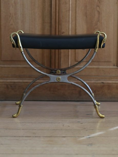 A Maison Charles brass, nickel and leather padded stool c.1970