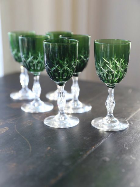 Set of six emerald green crystal aperitif glasses