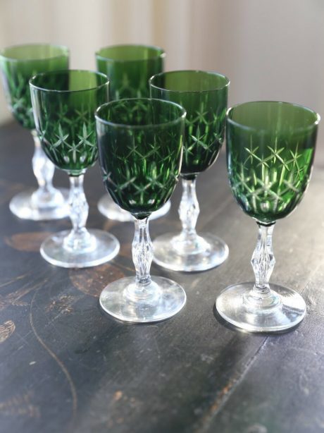 Set of six emerald green crystal aperitif glasses