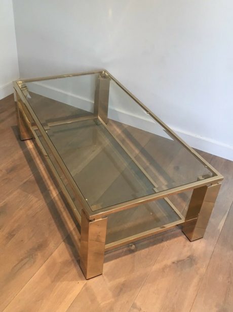 A striking brass and glass two tiered coffee table c.1980