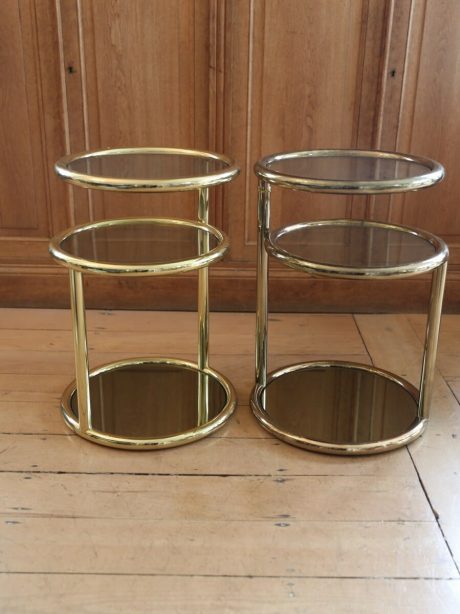 A pair of mid century Milo Baughman style brass side tables