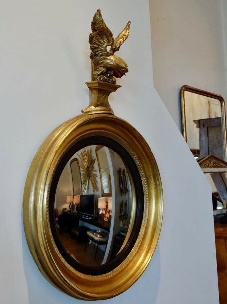 English Regency carved gilt wood eagle convex mirror c.1830