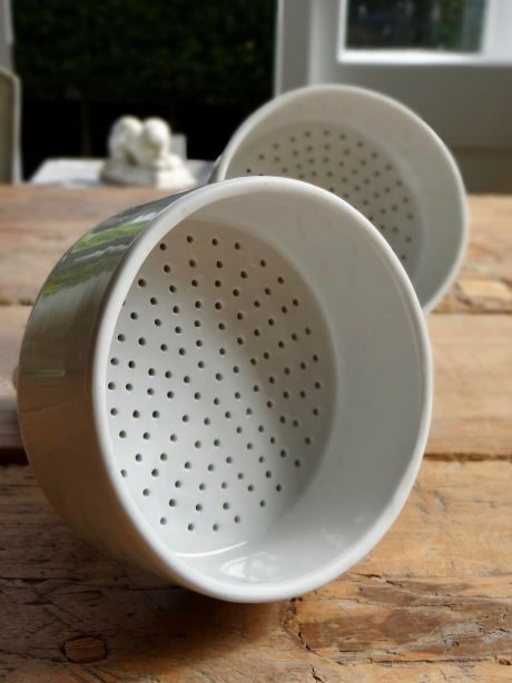 Pair of English vintage ceramic strainer funnels