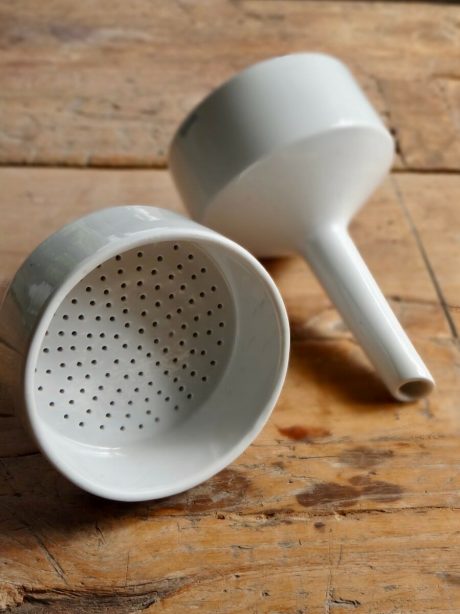 Pair of English vintage ceramic strainer funnels